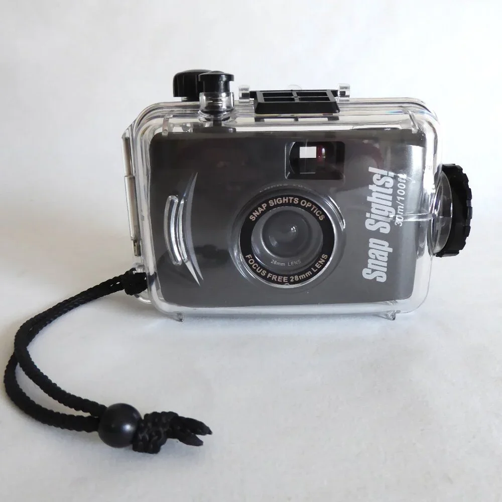 USED ONCE WATERPROOF SPORT UTILITY COMPACT 35mm CAMERA IN CASING